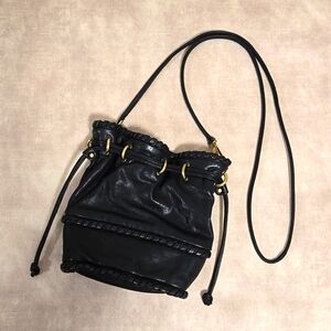 Kooba Pippa black leather small crossbody drawstring bucket bag